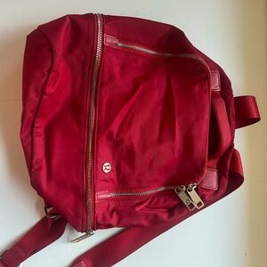 Lululemon  small Red Backpackgold hardware